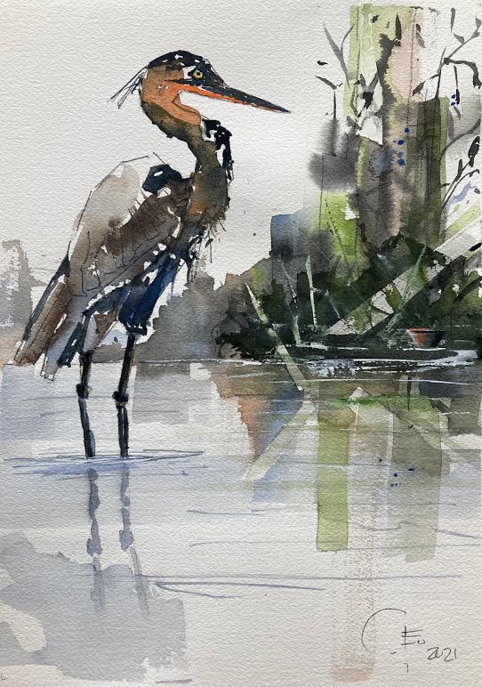 watercolor art piece of a heron standing in water
